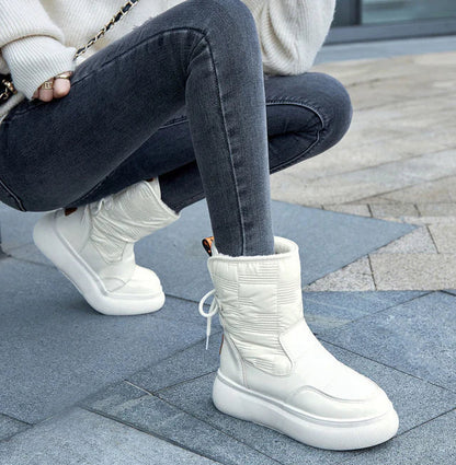 Botas de invierno para mujer con acabado brillante y plataforma
