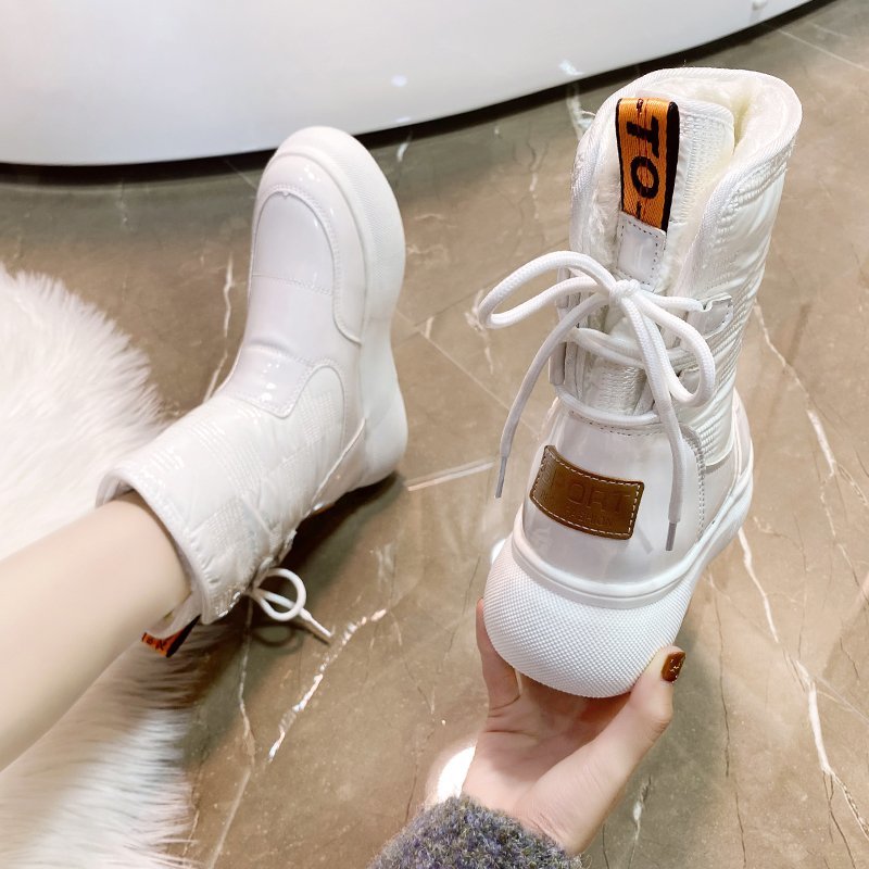 Botas de invierno para mujer con acabado brillante y plataforma