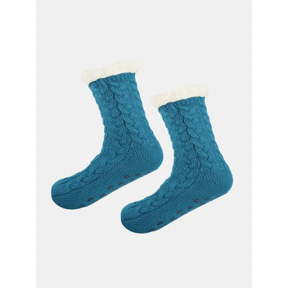 Kuschelsocken mit Zopfmuster und rutschhemmender Sohle