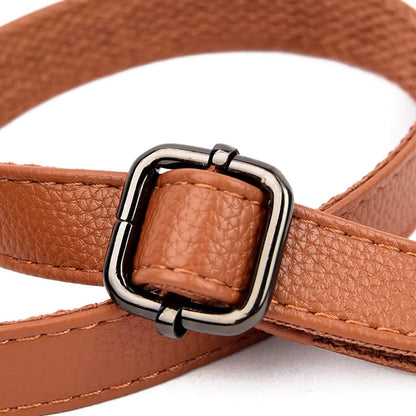 Damenhandtasche mit Schulterriemen und dekorativen Quasten