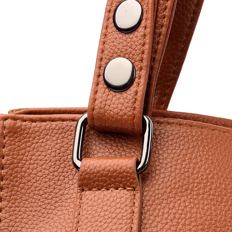 Damenhandtasche mit Schulterriemen und dekorativen Quasten